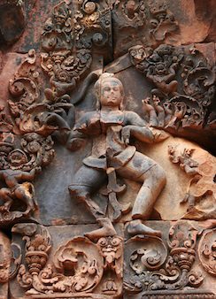 a_dancing_god_at_banteay_srei,cambodia