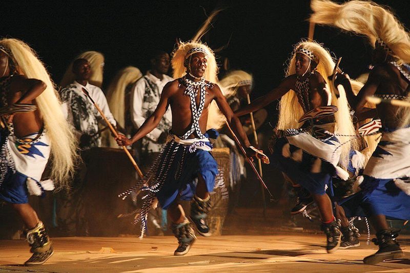 A group of Rwandans performing a vibrant cultural dance in Kigali