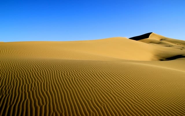 An endless stretch of sand across the land beneath the big blue sky- an unmissable sight for luxury travellers in Asia!